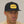 Black Marigold Patch Cap with the person wearing it looking straight on. 