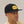 Black Cap with Marigold Color Clayborn Patch, black with white accents on the rope. 