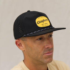Black Cap with Marigold Color Clayborn Patch, black with white accents on the rope. 