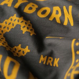 Closeup of the quilt design on the back of the t-shirt feature a Block C in a quilt pattern