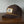brown corduroy hat with rope and a patch of a mallard duck carrying a bomb